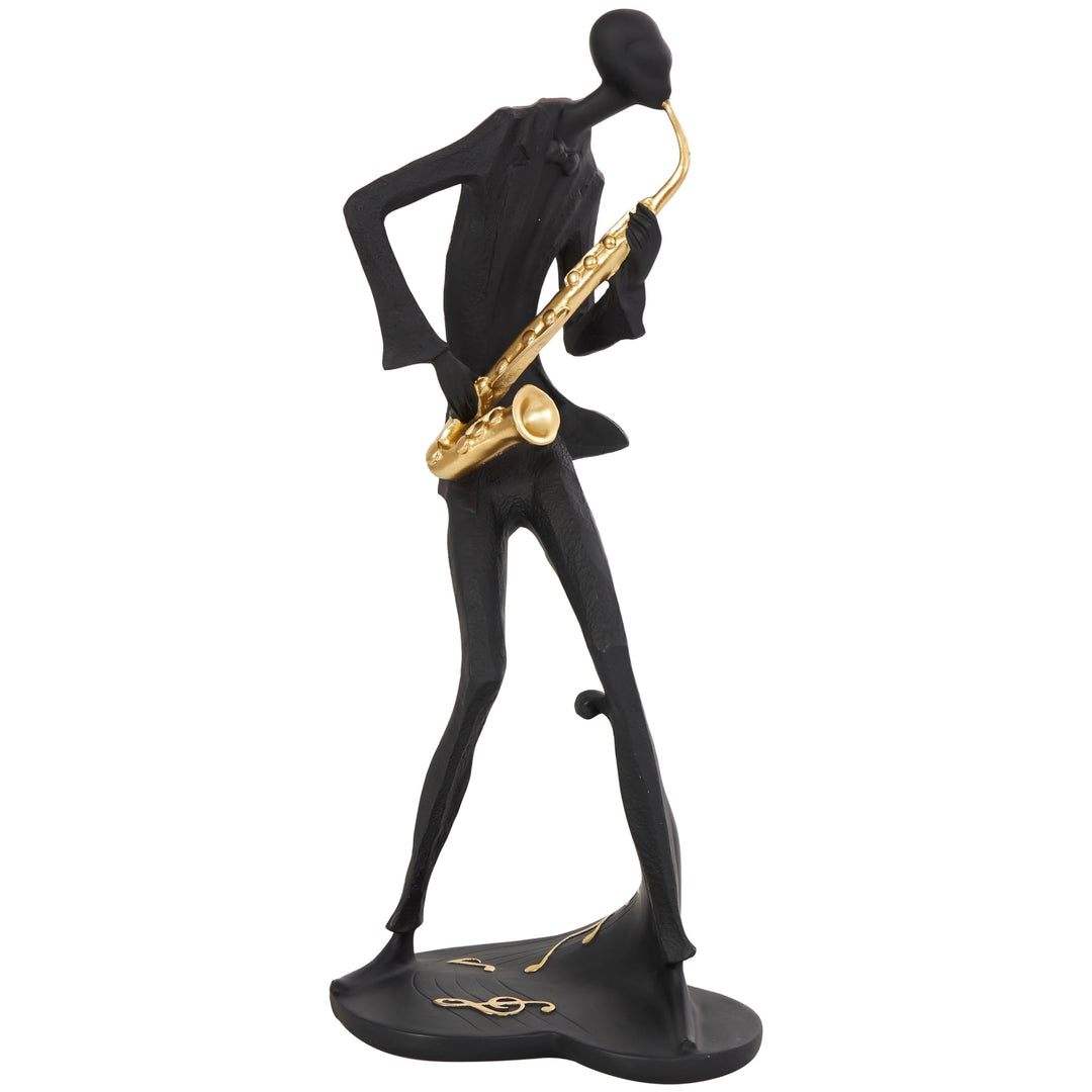 Black Polystone Abstract Musician Sculpture with Gold Instruments and Music