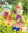 Set 2 Garden Scarecrows Sitting Hay Color